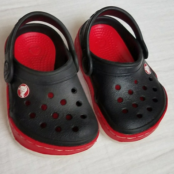white and red crocs